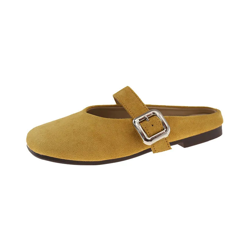 Women's flat closed toe slippers in apricot colour with a square toe and rubber sole.