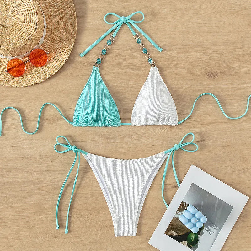 Women's lace-up front swimsuit with pearl chain, colour matching bikini top and shorts set.