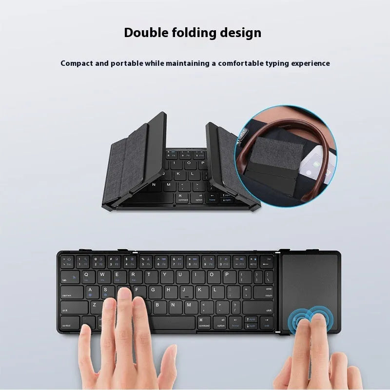 Black folding Bluetooth keyboard for mobile phones and tablets shown unfolded.