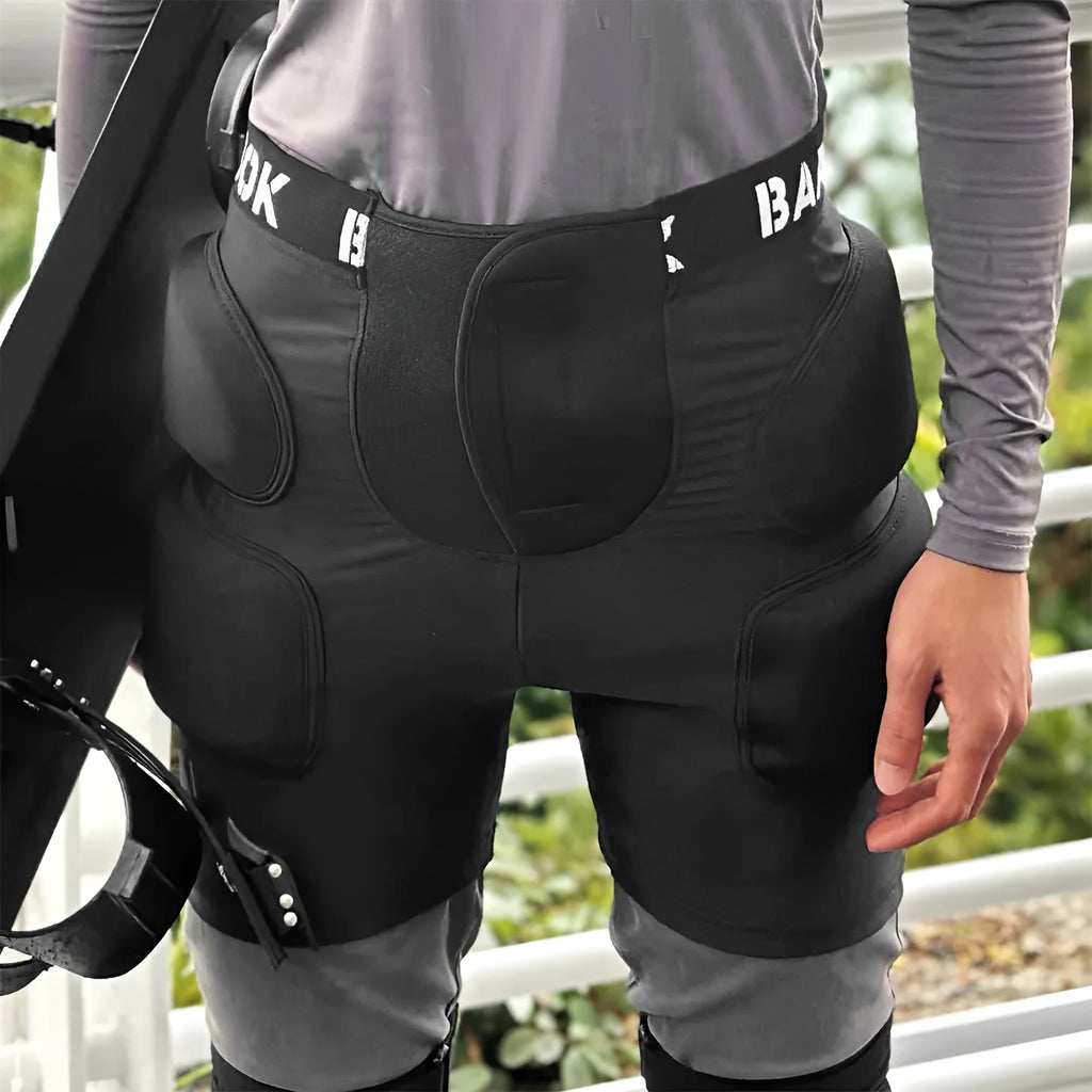 Black skateboarding hip pad pants with NBR protection padding for roller skating and ski equipment safety