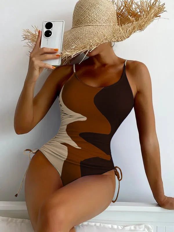 Women's sleeveless one-piece swimsuit in blue colour with backless design for swimming sports