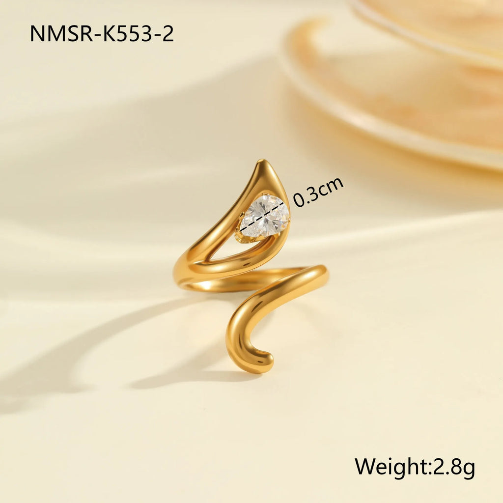Geometric stainless steel zircon ring with open mouth design showing round, oval and quadrangle elements