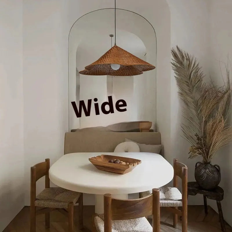 Silent Style natural rattan woven ceiling lamp with black metal trim in three diameter sizes.