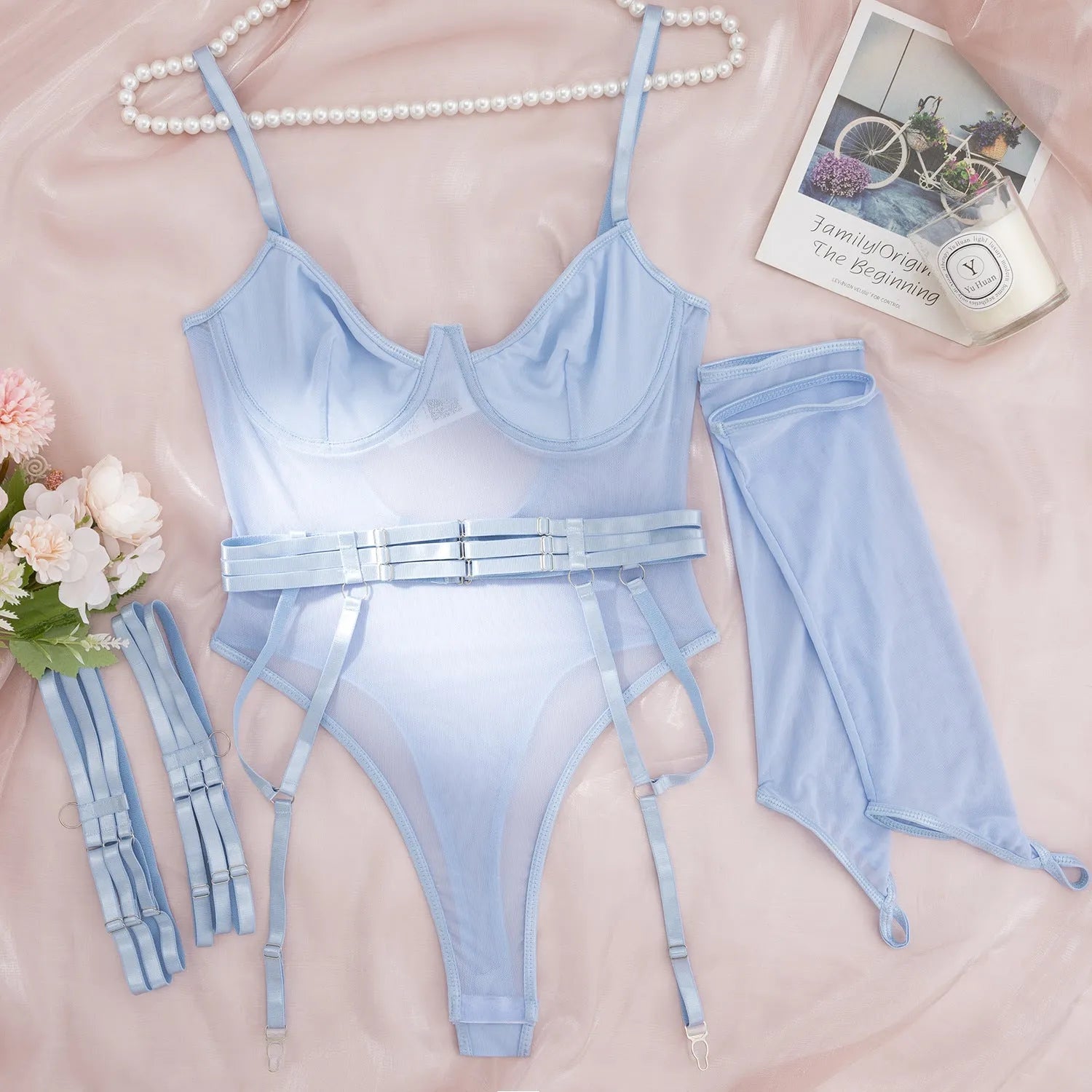 Women's transparent black mesh jumpsuit, a one-piece tights-style garment made from polyester fabric.