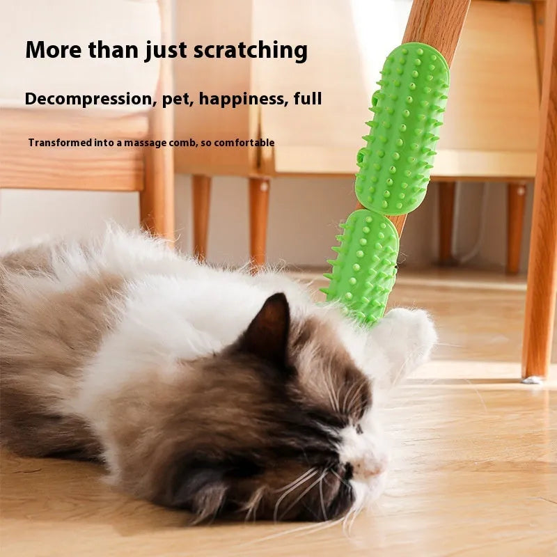 Silicone cat grooming comb with adjustable strap mounted on a table leg, shown in assorted colours.