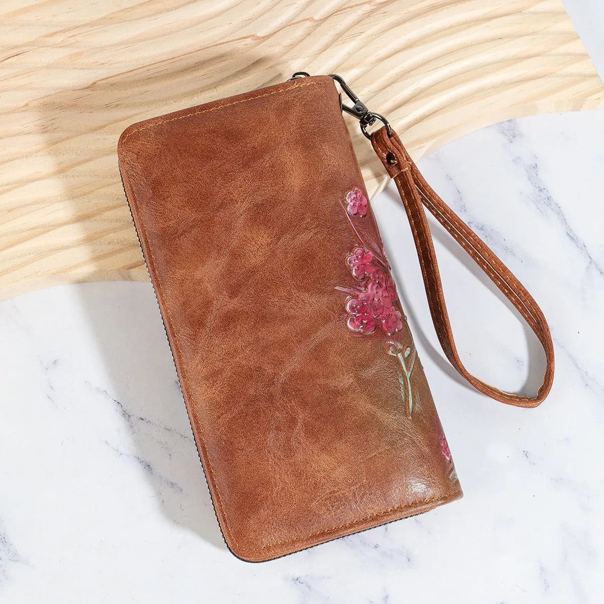 Chinese style floral embossed handbag with hand-painted pattern and zip closure