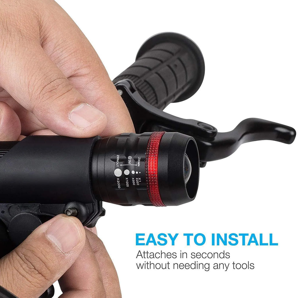 Bicycle light set showing a white-fronted torchlight, a red taillight, and a handlebar mounting bracket.