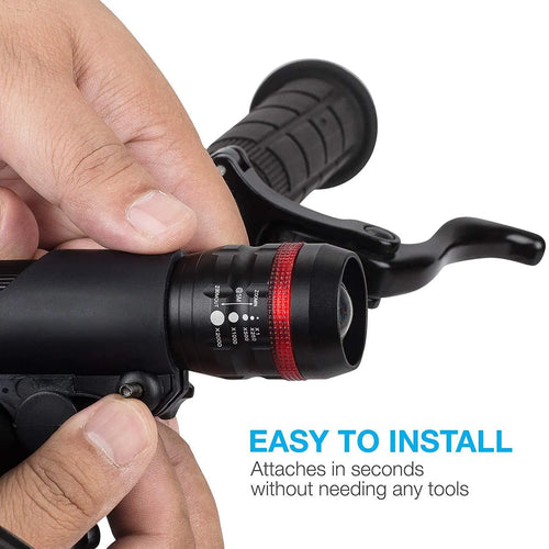 Bicycle light set showing a white-fronted torchlight, a red taillight, and a handlebar mounting bracket.
