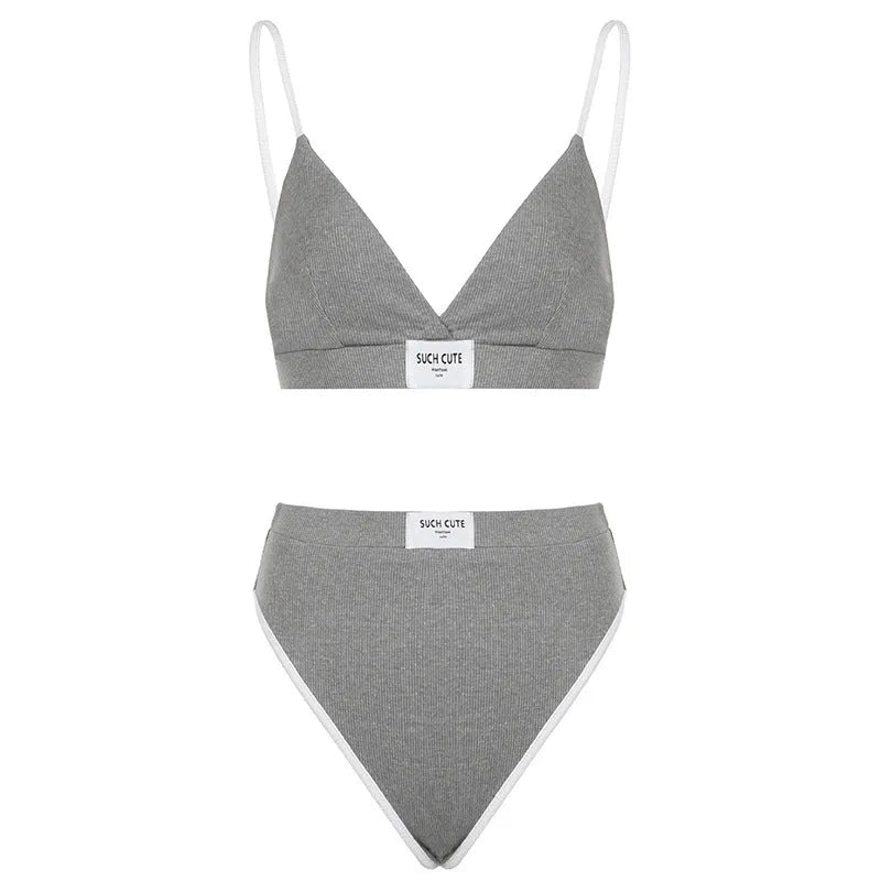 Women's grey polyester bikini set with embroidery and contrast colour binding on sleeveless top and shorts