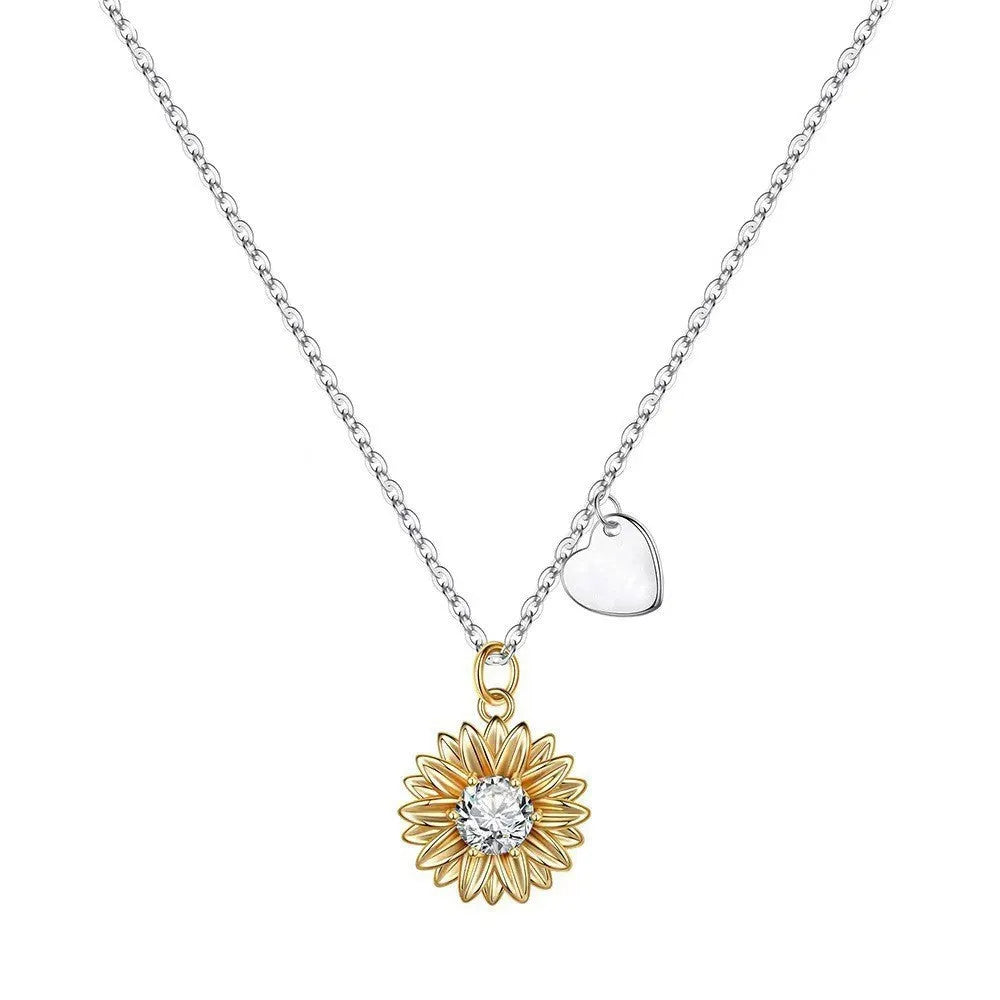 925 sterling silver sunflower necklace with daisy petal detail on an adjustable cross chain