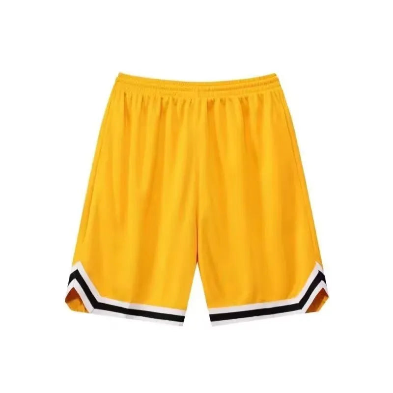 Man wearing loose grey sports shorts made from elastic polyester fabric.
