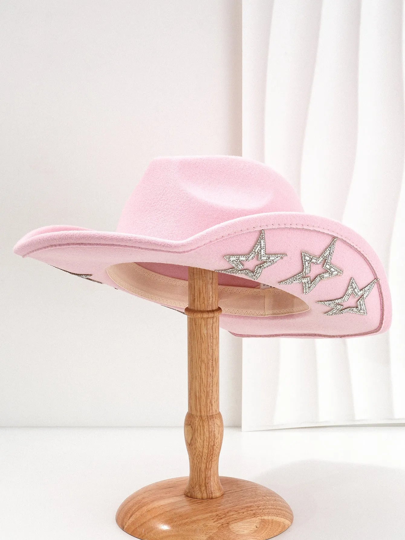 Brown polyester western-style top hat with a conical crown and a silver hexagonal star decoration on the front.