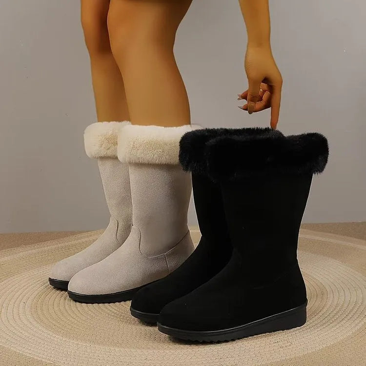 Fleece-lined mid-calf snow boots in black, with waterproof platform sole and round toe