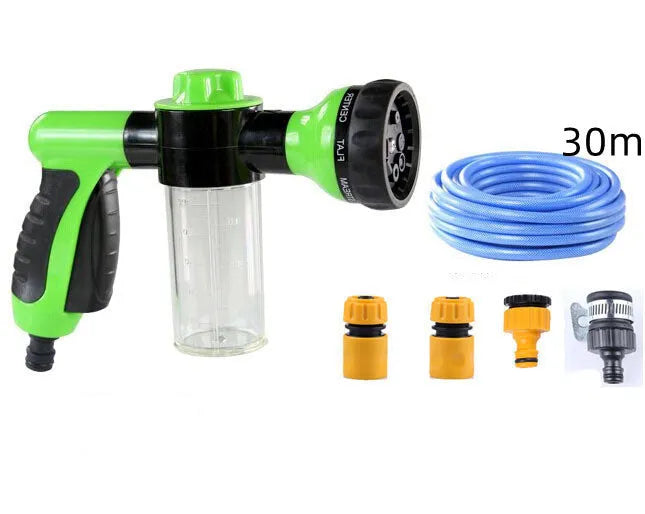 Green high pressure foam spray gun with adjustable nozzle for car washing and household cleaning.