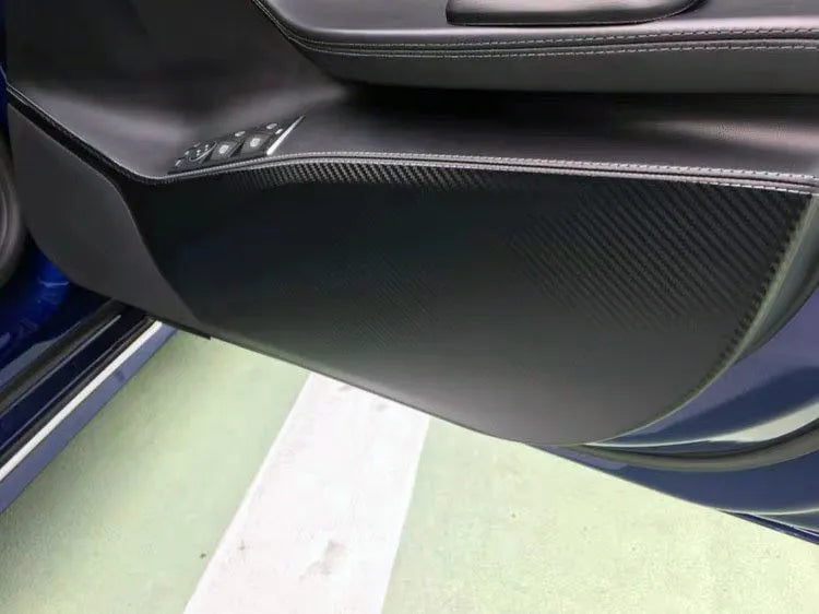 Carbon fibre protective film for Tesla Model S door interior control panels in 4-piece set