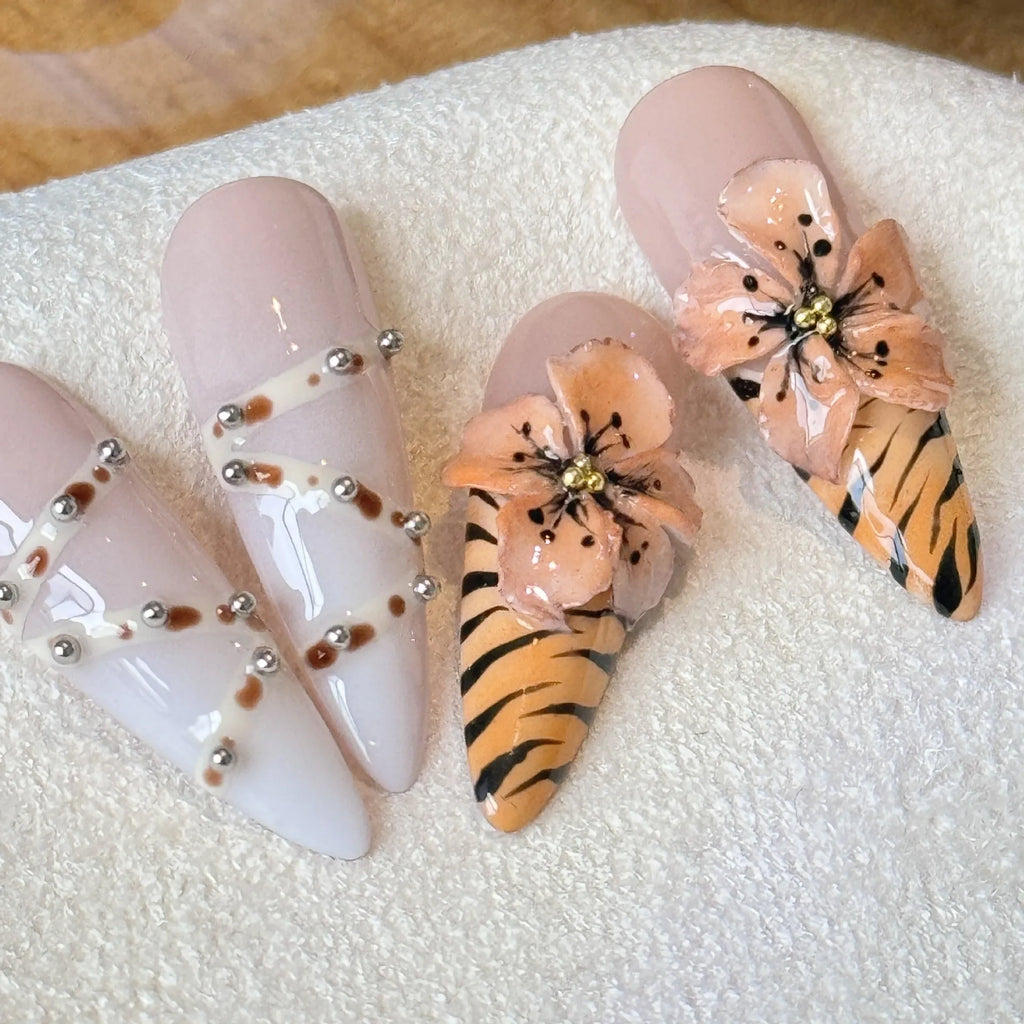 Set of long-tip nail stickers featuring leopard print, cross, and flower patterns in four sizes.