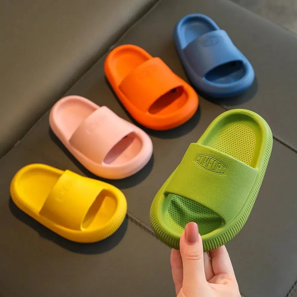 Children's brightly coloured EVA slippers with a thick, non-slip sole.
