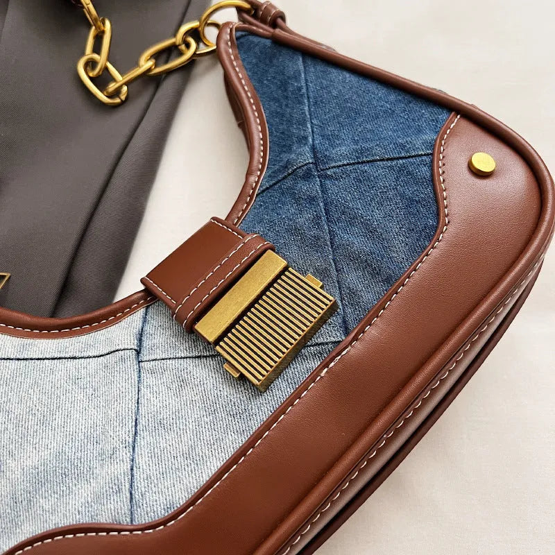 Brown denim women's shoulder bag with chain detailing and bucket shape design