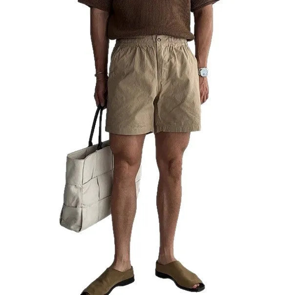 Cotton loose fit sports shorts in black, white or khaki colours for summer sports activities