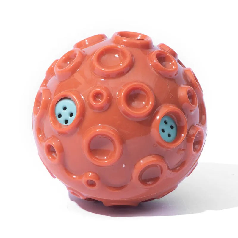 Durable natural rubber dog ball toy with textured surface and squeaker for aggressive chewers.