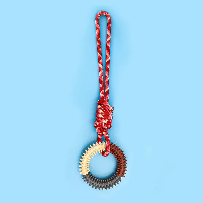 Braided cotton rope knot dog toy in bright colours for biting and tug of war play