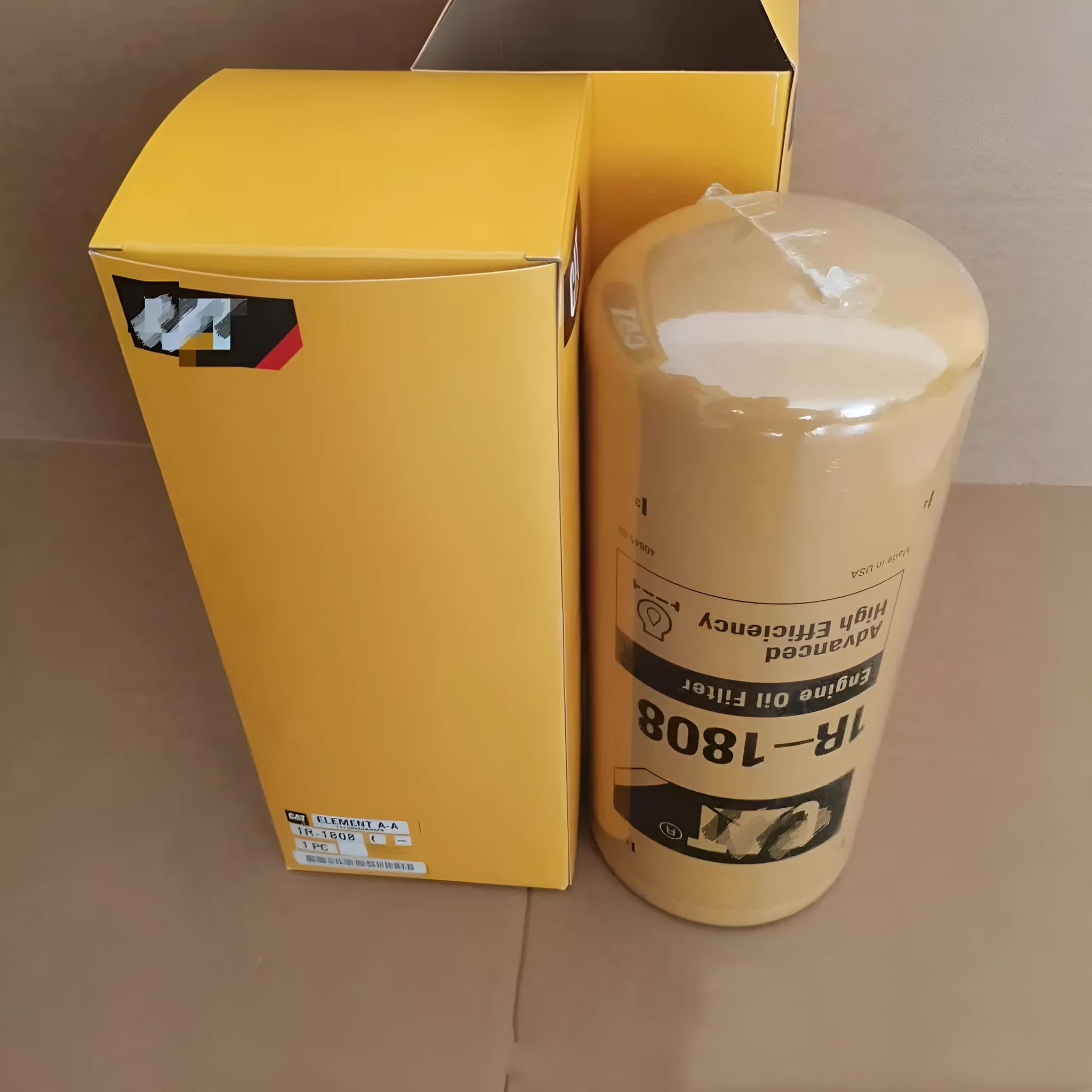 Carter 1R-1808 metal oil filter element with folded design for excavator hydraulic systems.