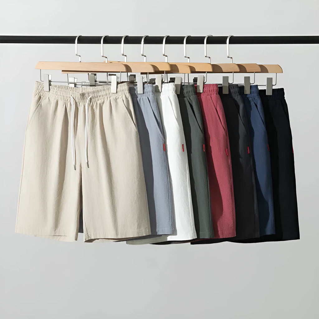 Cotton-linen blend cropped pants in a solid colour with a drawstring waist, shown in a mid-length cut.
