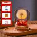 Dandelion-shaped glass night light ornament in a gradient colour with soft internal LED glow.