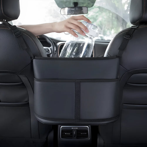 Black leather car seat storage net pocket with sports carbon fibre pattern.