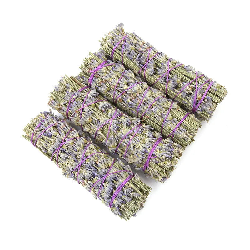 A single 4-inch long lavender aromatherapy stick made from natural dried flowers on a plain background.