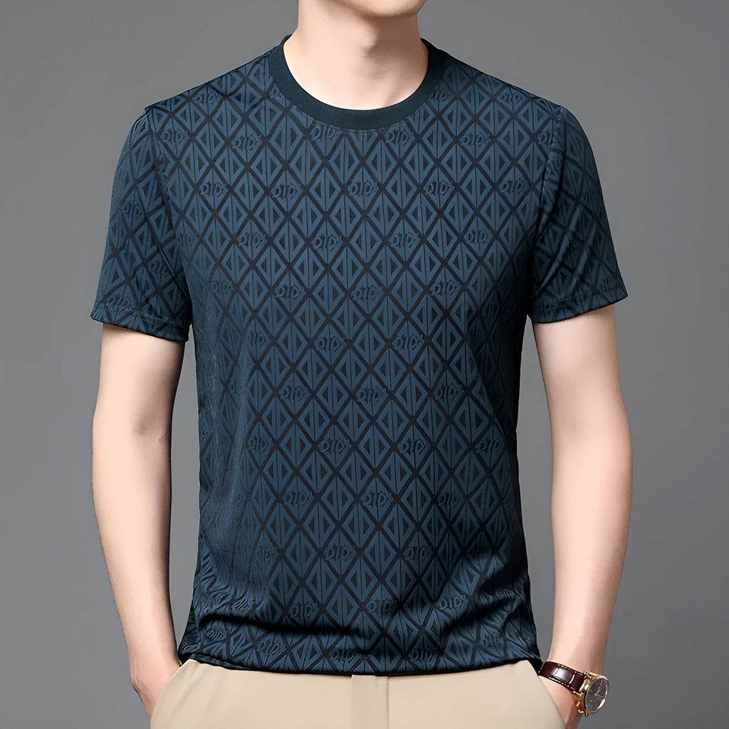 Man wearing a black loose-fit jacquard short sleeve t-shirt made from cool Ice Silk fabric.