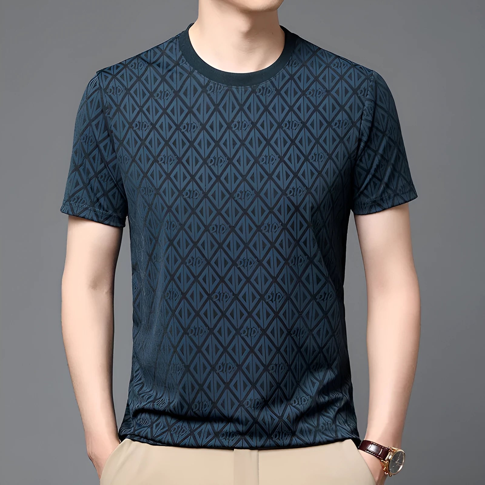 Man wearing a black loose-fit jacquard short sleeve t-shirt made from cool Ice Silk fabric.