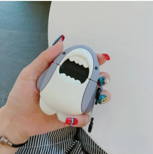Silicone protective skin cover on a pair of white Apple AirPods 1 or 2 wireless earbuds.