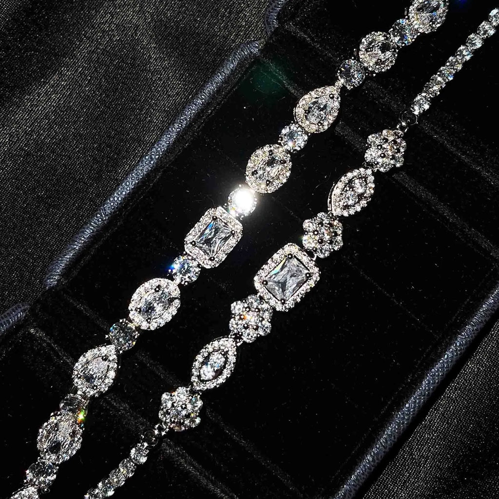 Women's geometric bracelet with silver and white gold plating and sparkling inlaid zircon stones.
