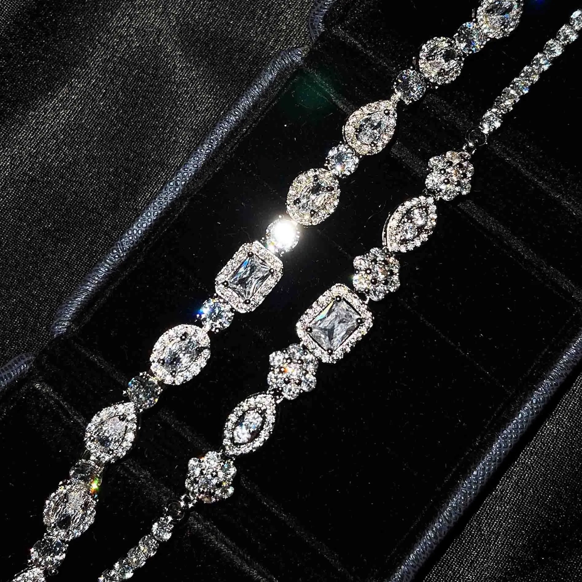 Women's geometric bracelet with silver and white gold plating and sparkling inlaid zircon stones.