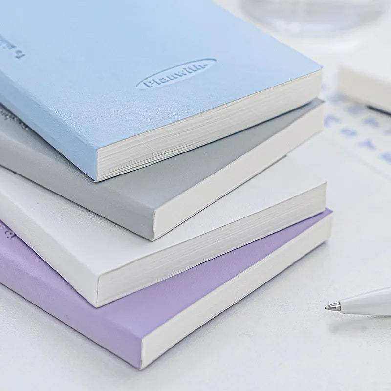 Embossed metre book notebook showing five cover colour options: white, purple, blue, grey and protective cover