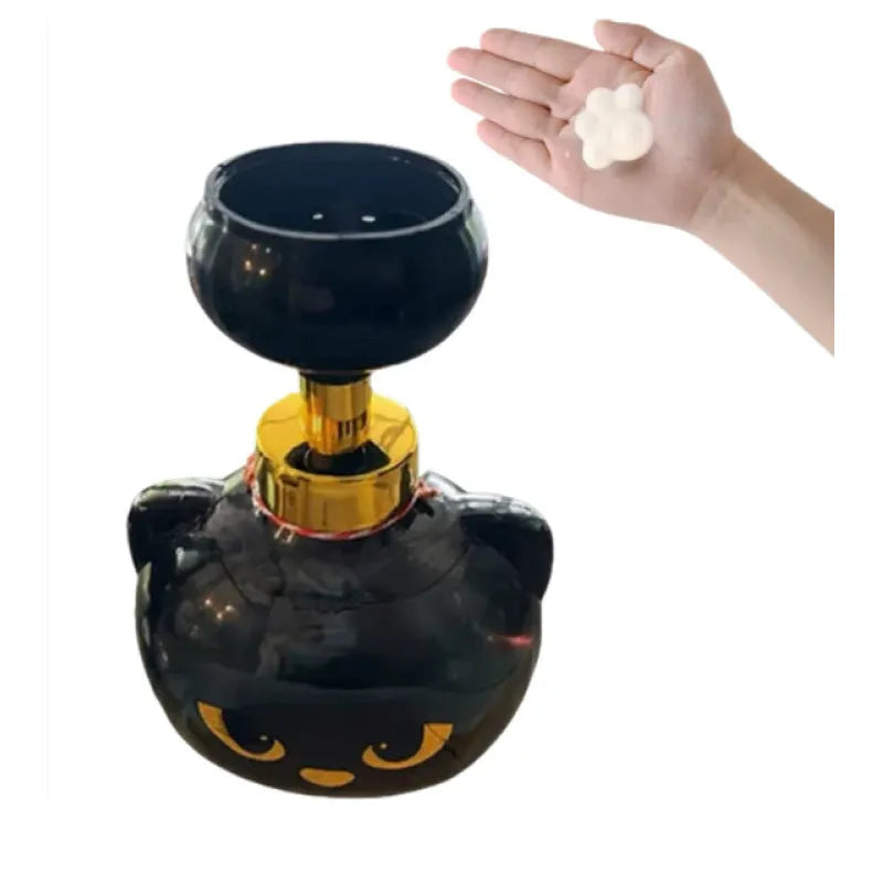 Black cartoon cat shaped soap extrusion dispenser measuring 10 by 18 centimetres