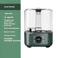 Green KC-112 intelligent humidifier with touch screen display and remote control on a table.
