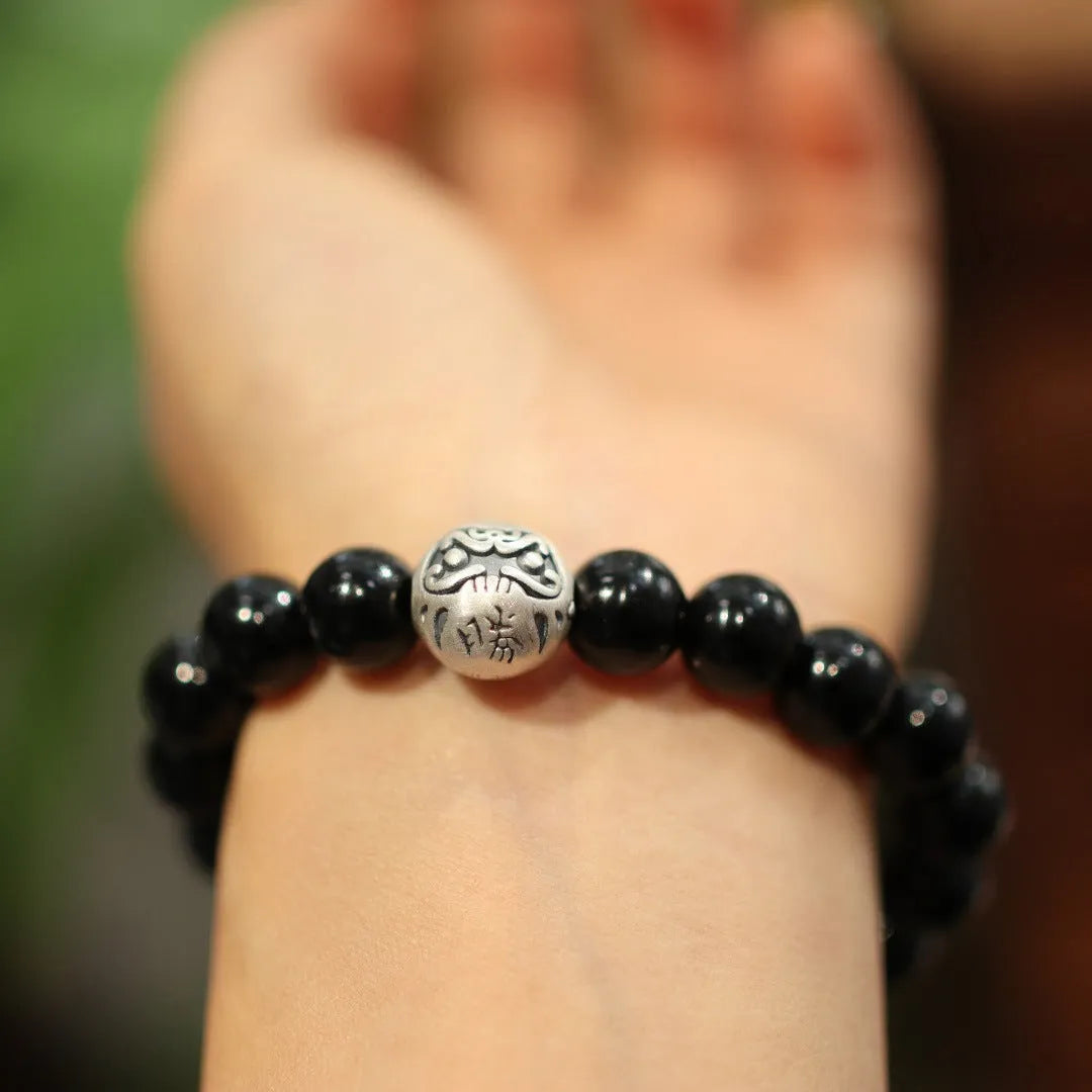 10mm black agate bracelet with sterling silver detailing in Chinese ethnic design style
