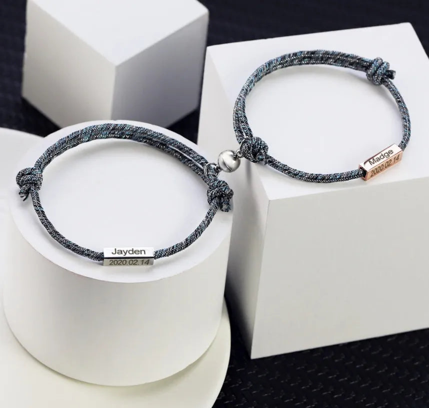 Pair of stainless steel magnetic couples bracelets with silver and rose gold finish, adjustable rope length