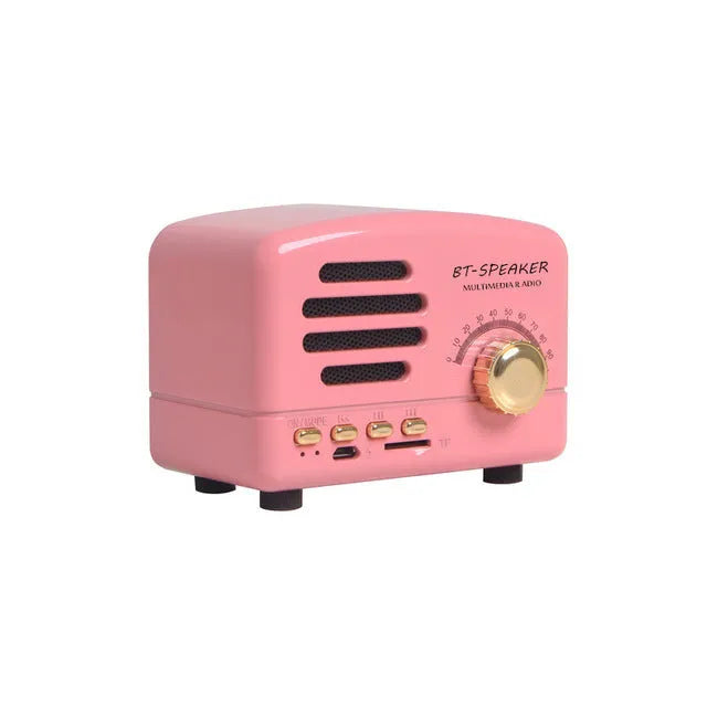 Vintage wood Bluetooth speaker in pink, black, and wood grain colours showing compact 93mm design