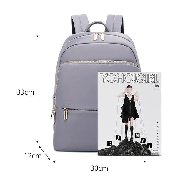 Large black Oxford cloth women's backpack with organisational compartments and a breathable back panel.