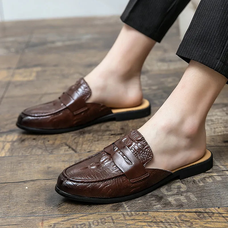 Men's closed toe half-support crocodile pattern PU leather slippers in black, side view
