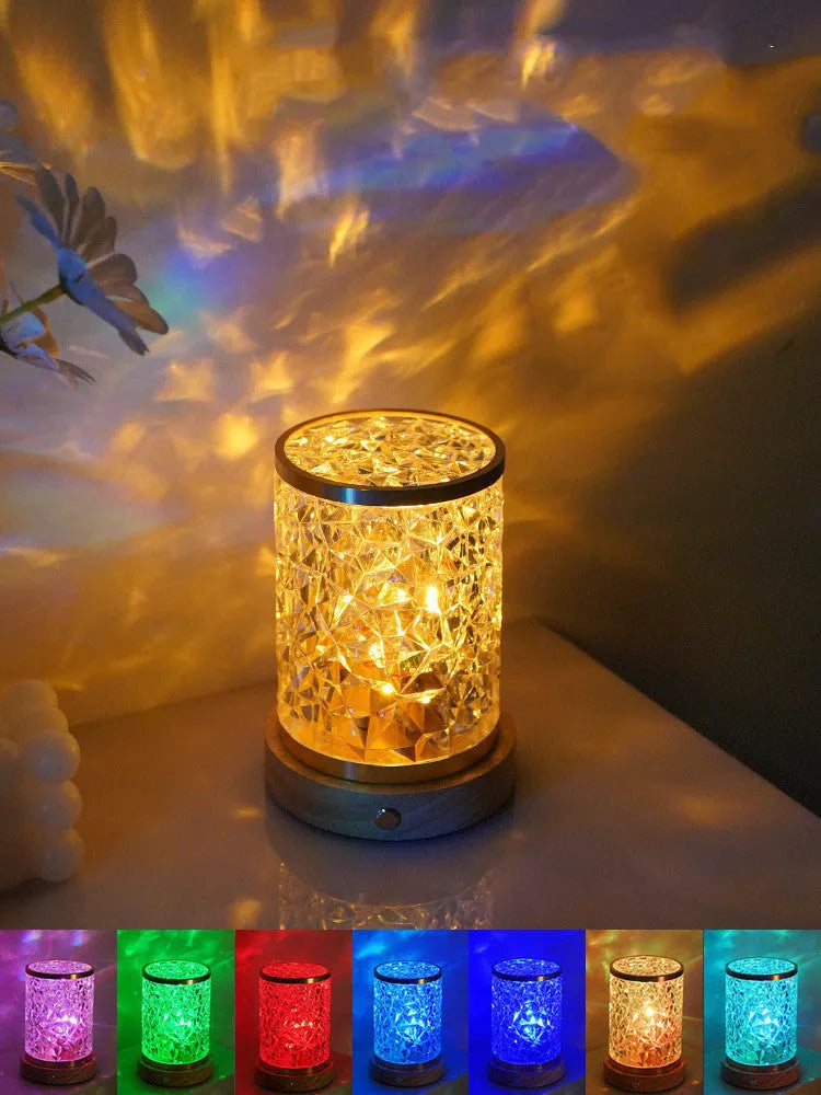 Small rotating water ripple night light with acrylic shade on solid wood base