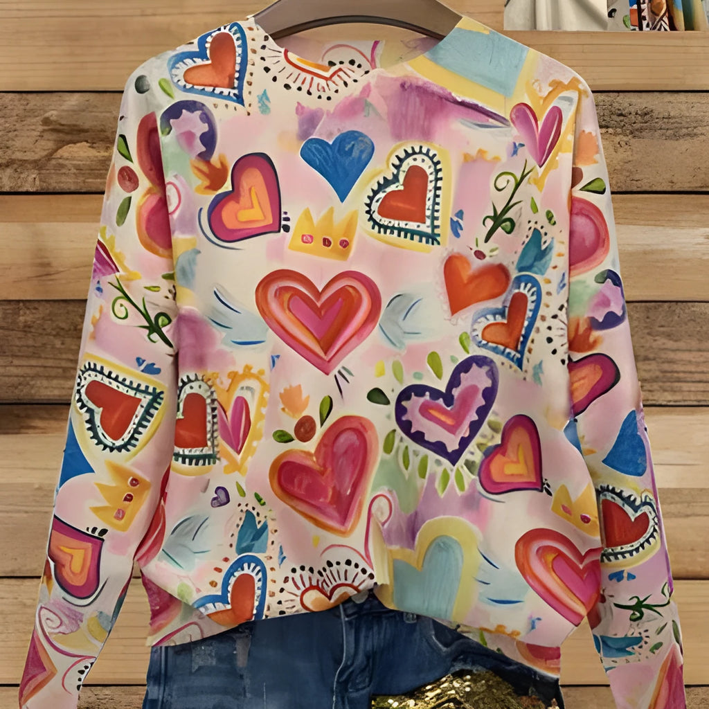 Loose fit digital printed top with lapel collar on a hanger, showing custom print artwork.