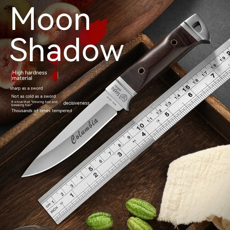 National style stainless steel camping knife with a leather sheath.