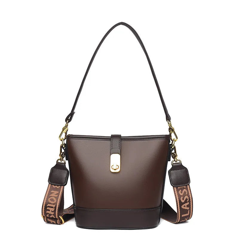 Korean style soft PU bucket messenger bag with adjustable straps in black showing internal zipper compartments