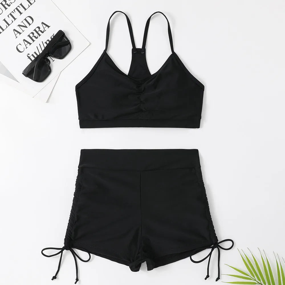 Women's high-waist split swimsuit bikini in purple or black with sleeveless design