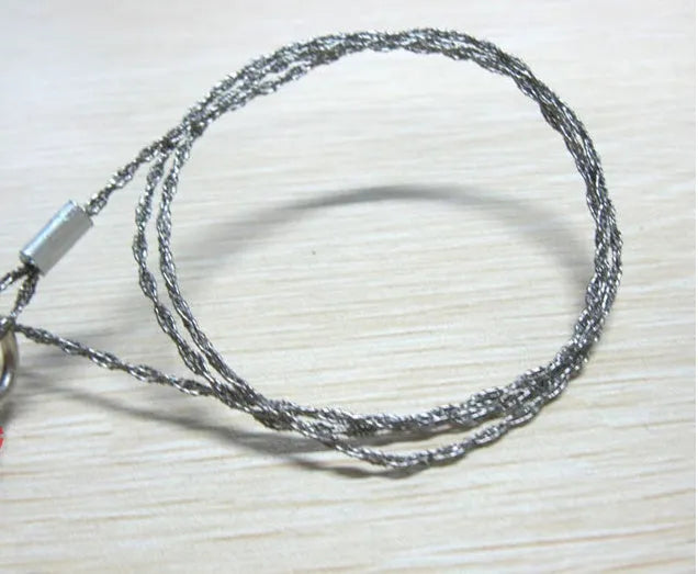 70cm stainless steel survival wire saw with thumb rings showing 600mm cutting blade