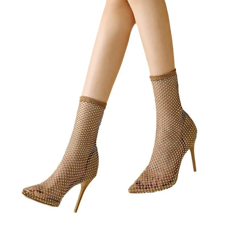 Gold stiletto pointed mesh high heel sandals with oversleeve fitting as shoe covers